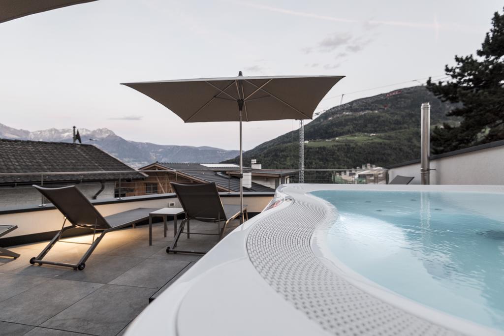 Alpin & Stylehotel Die Sonne Parcines Esterno foto